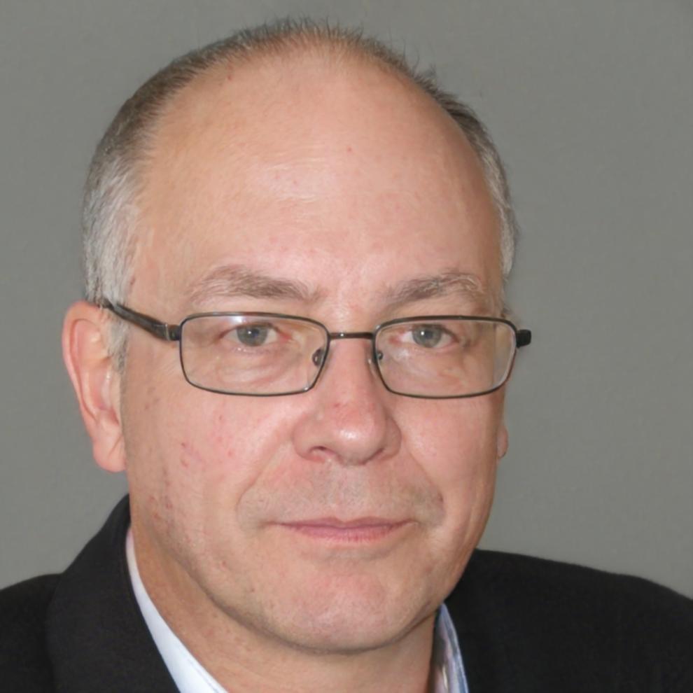 Professional headshot of senior negotiation methodology researcher